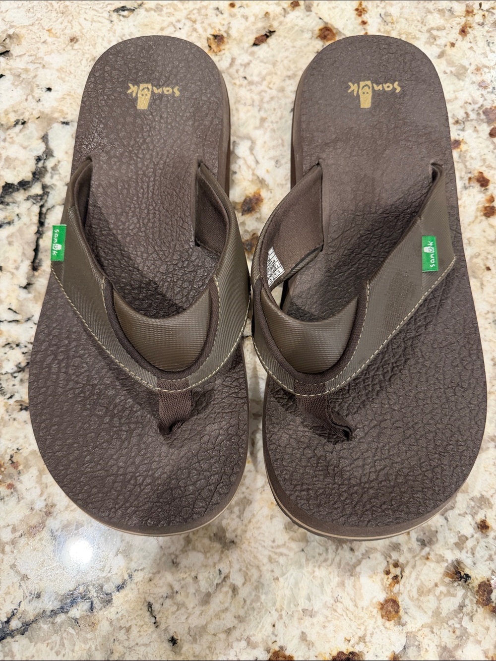 Sanuk Brown Flip Flops with Green Logo Tabs
